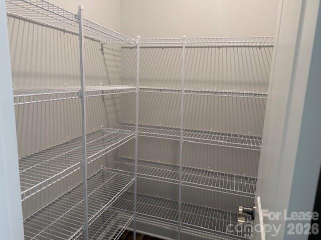 8829 Wingard Road Waxhaw, NC 28173 - Photo 6 of 21 a bathroom with a glass shower door