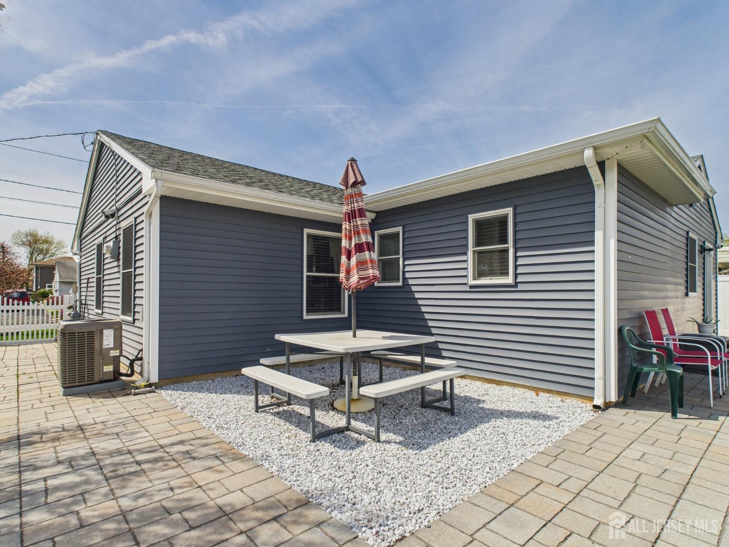 67 Columbus Avenue Edison, NJ 08817 - Photo 20 of 23 a outdoor space view with a sitting space