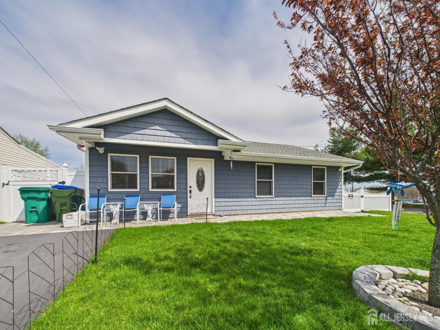 67 Columbus Avenue Edison, NJ 08817 - Photo 2 of 23 a front view of house with a garden
