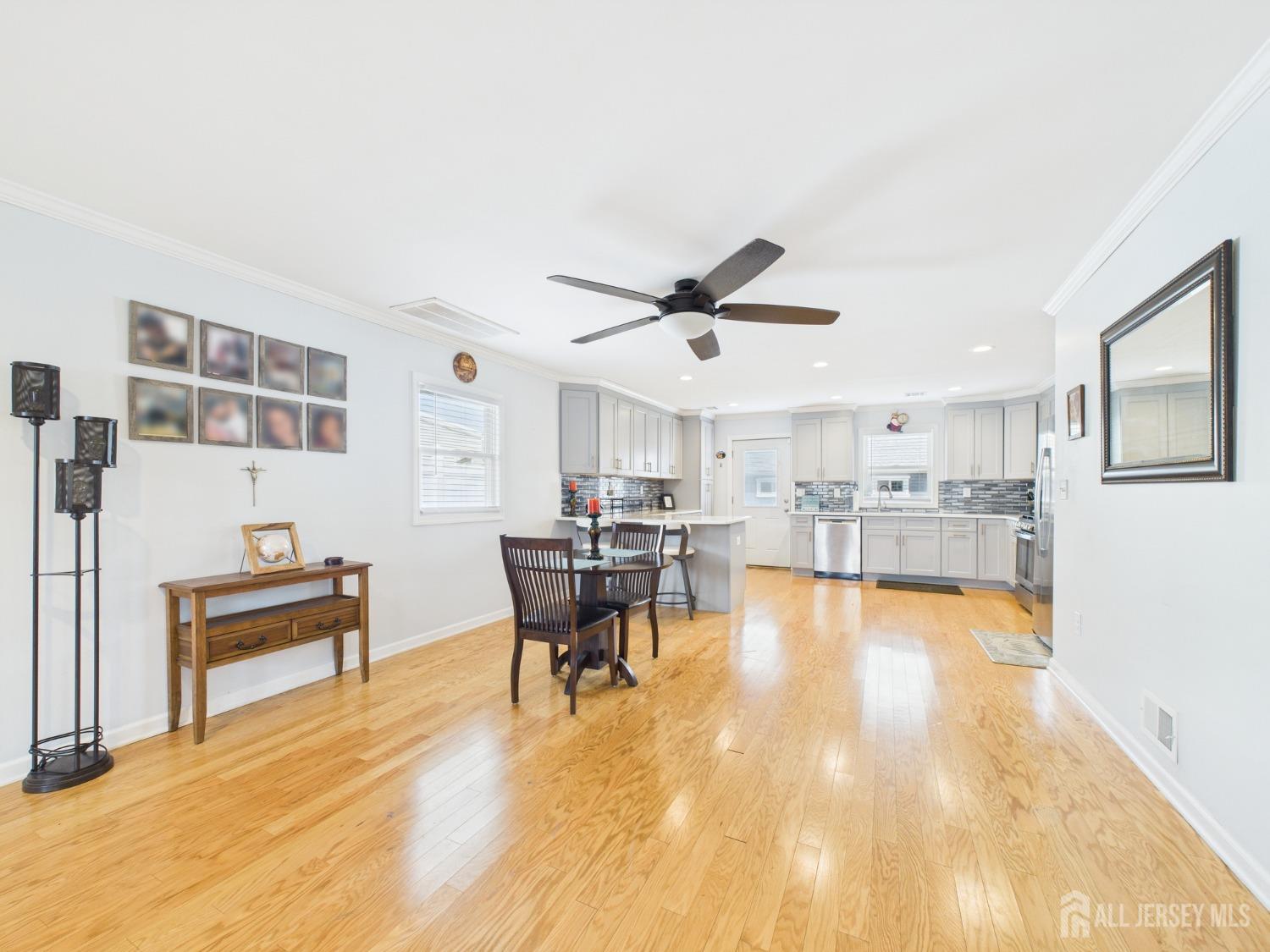 67 Columbus Avenue Edison, NJ 08817 - Photo 8 of 23 a view of a livingroom with furniture and a workspace
