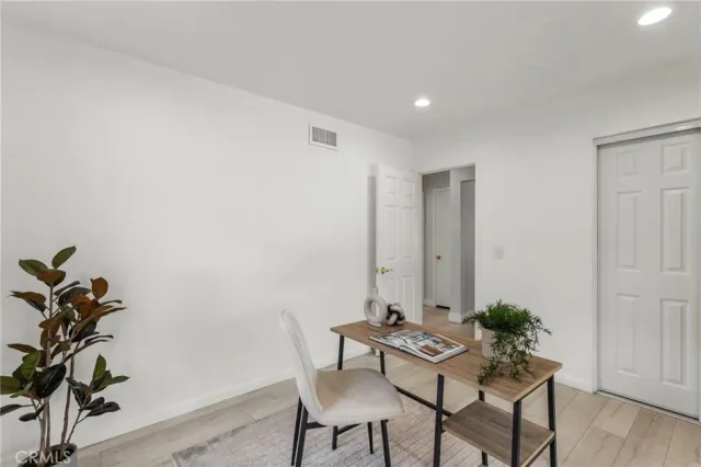 a bathroom with a shower and a sink