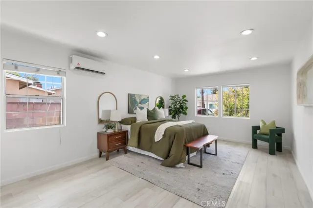 a kitchen with refrigerator a sink and cabinets