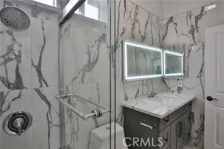 a view of a car park in front of a house