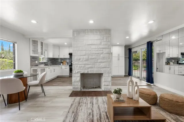a dining room with furniture and window