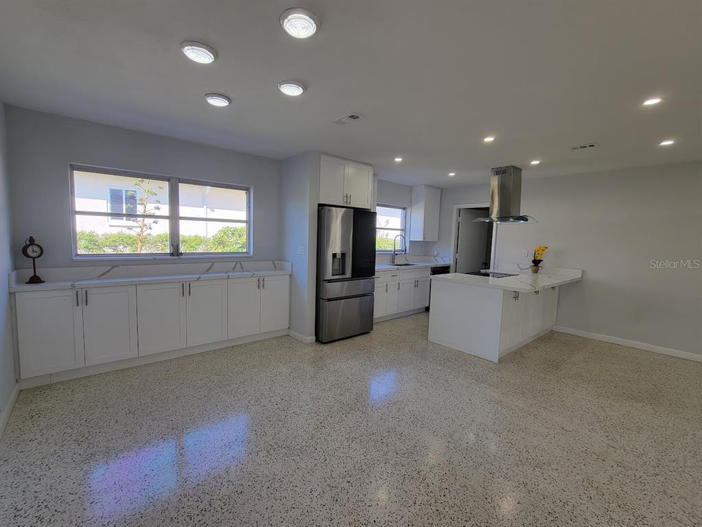 1732 Boca Raton Court Punta Gorda, FL 33950 - Photo 28 of 64 a view of a kitchen with furniture and window