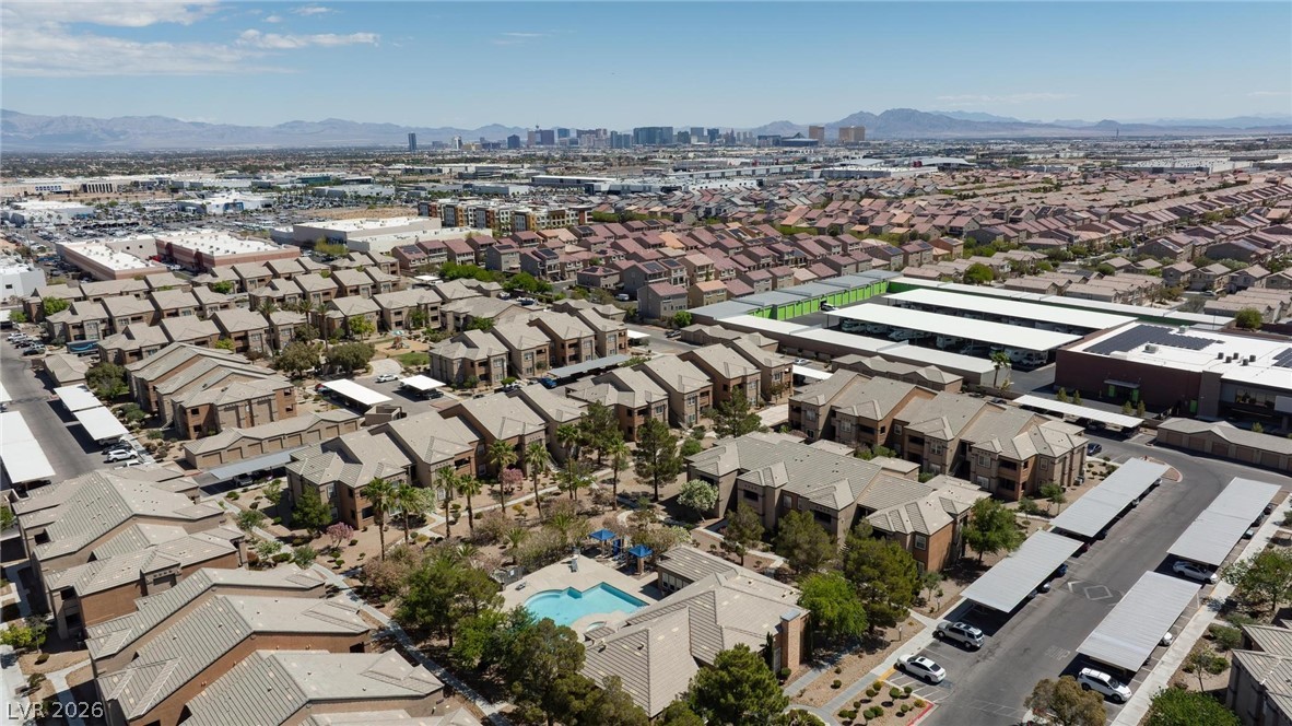 6650 West Warm Springs Road, Unit 2027 Las Vegas, NV 89118 - Photo 26 of 29 An aerial perspective showcases a vibrant community with diverse architecture and inviting outdoor spaces.
