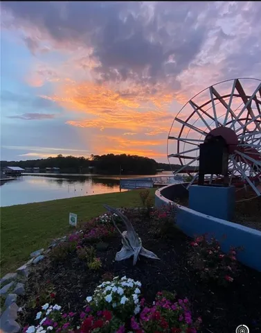 a view of a lake and a yard
