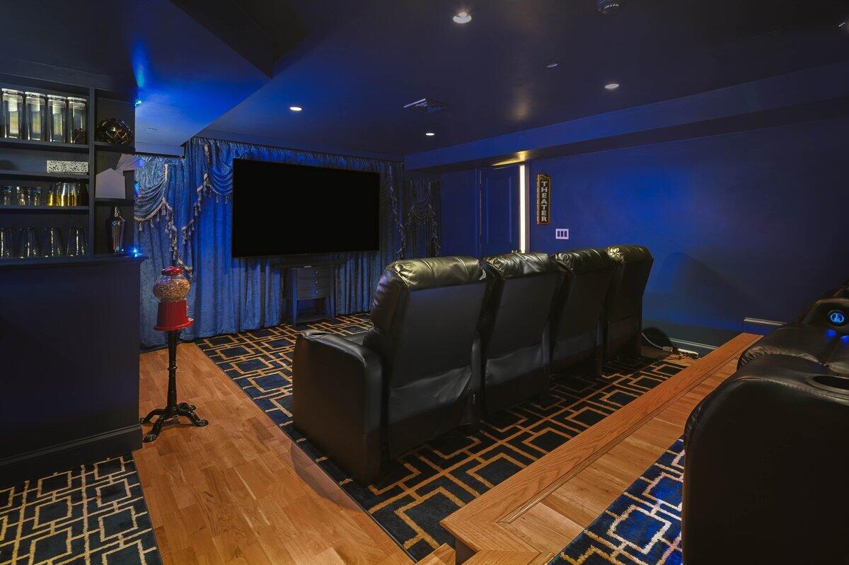 77 Tide Run Mashpee, MA 02649 - Photo 24 of 44 a living room with furniture and a flat screen tv