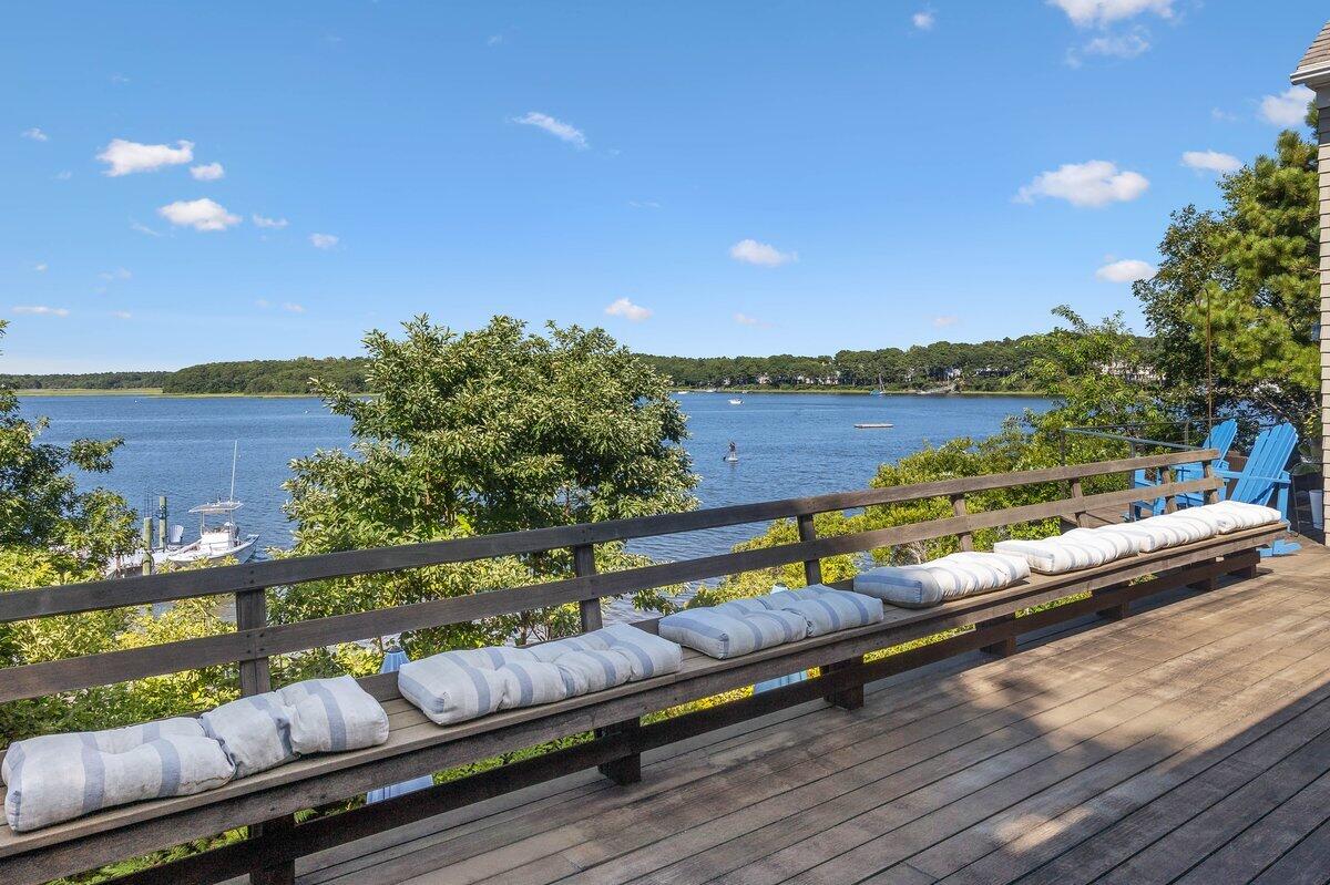 77 Tide Run Mashpee, MA 02649 - Photo 40 of 44 a view of a terrace with outdoor seating
