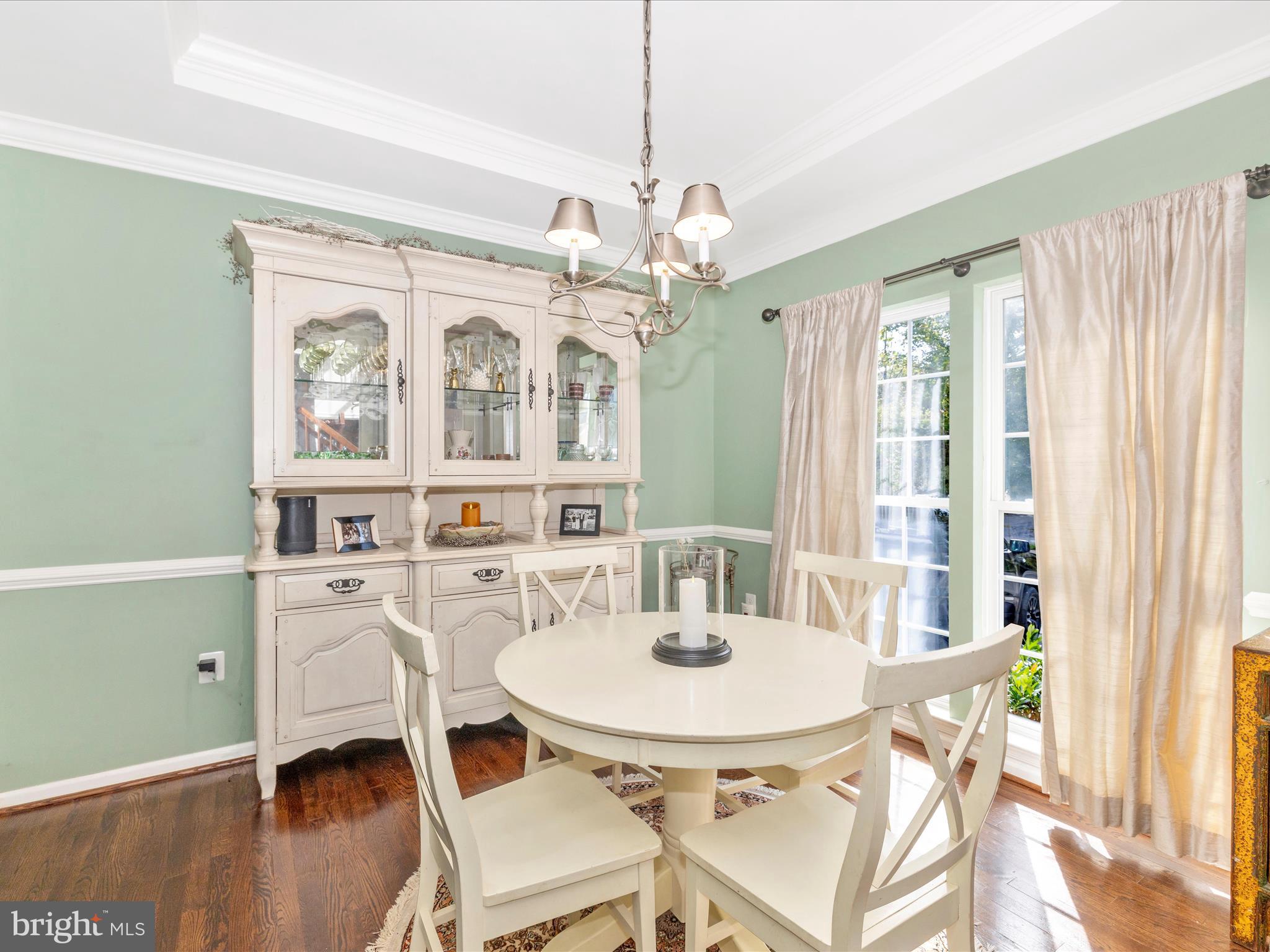 11046 Country Club Road New Market, MD 21774 - Photo 11 of 105 a view of a dining room with furniture window and wooden floor