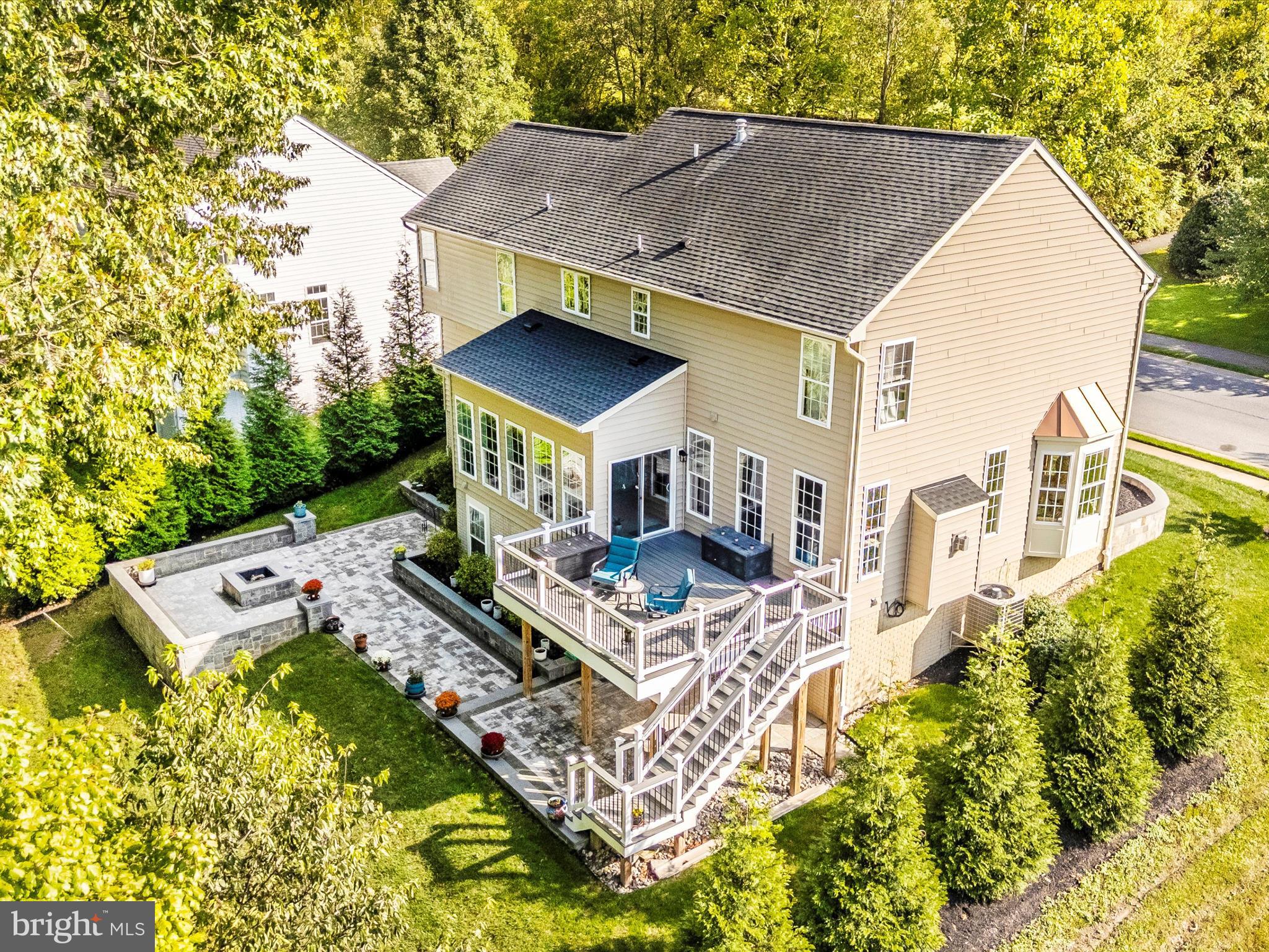 11046 Country Club Road New Market, MD 21774 - Photo 2 of 105 a view of a house with roof deck and sitting area