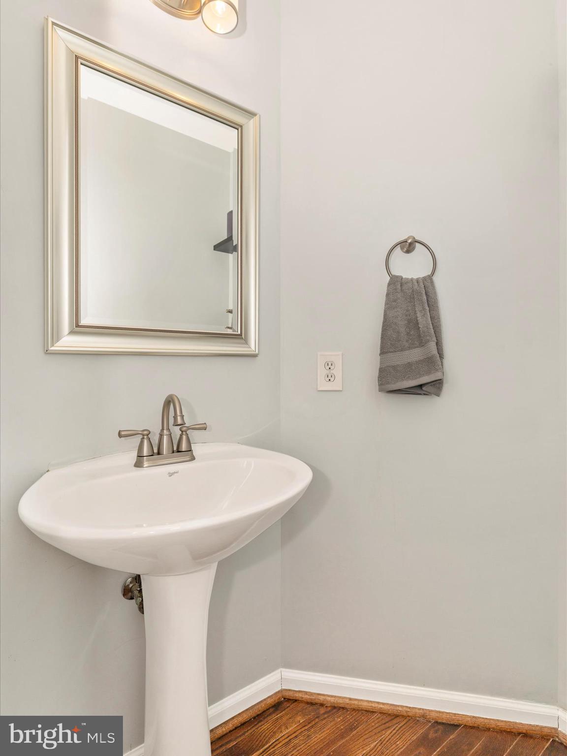 11046 Country Club Road New Market, MD 21774 - Photo 26 of 105 a bathroom with a sink and a mirror