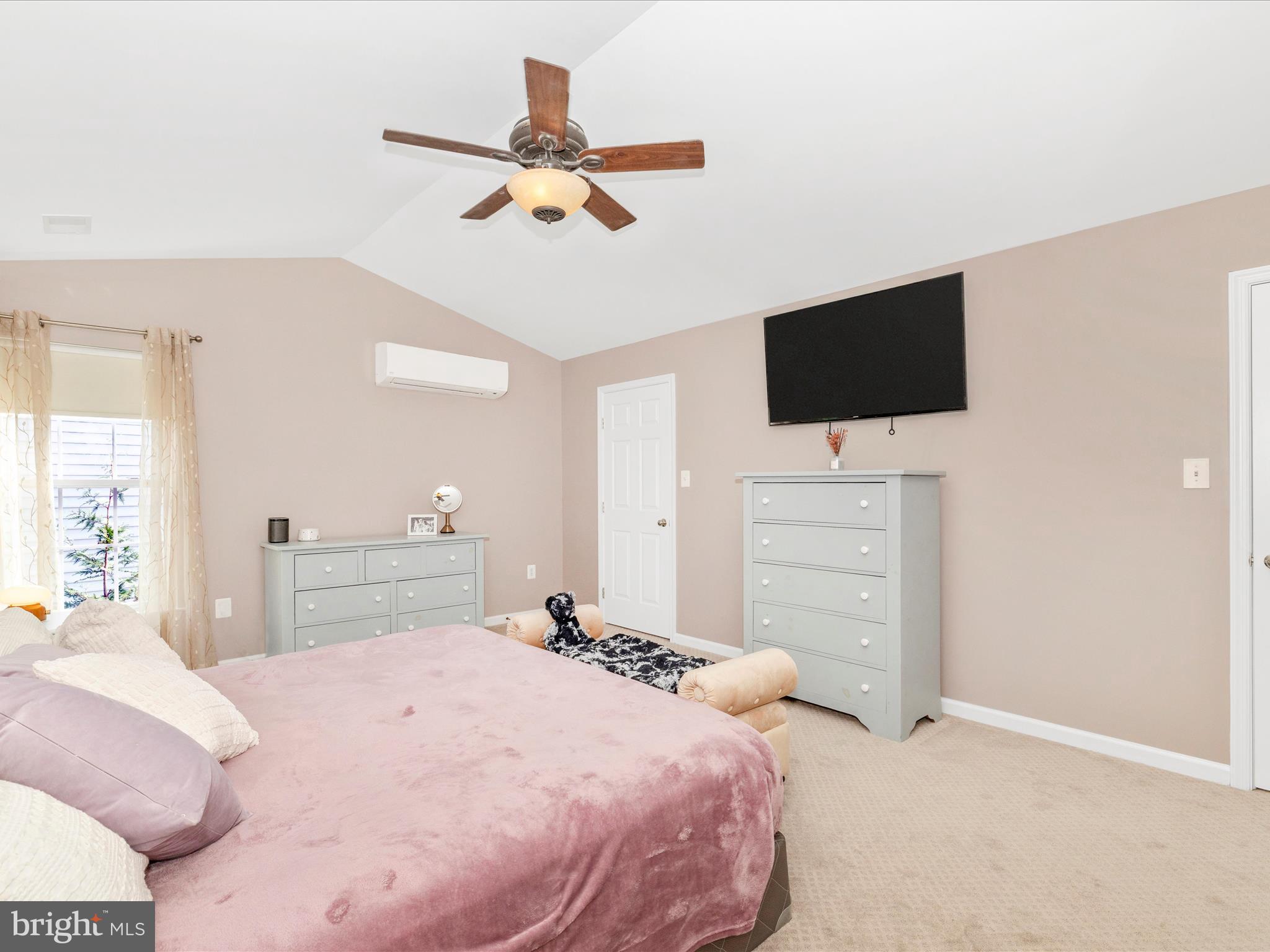 11046 Country Club Road New Market, MD 21774 - Photo 31 of 105 a bedroom with a bed and a flat screen tv