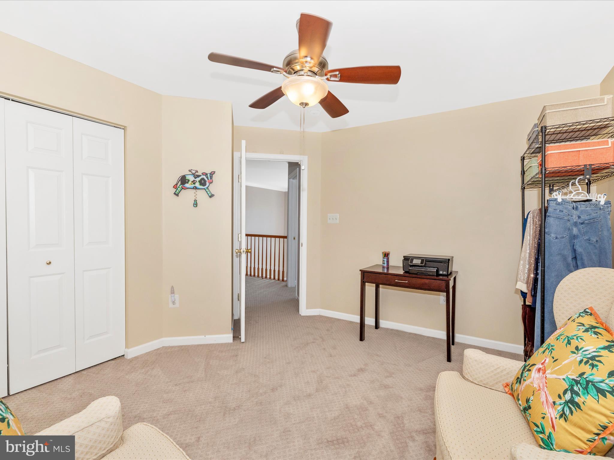 11046 Country Club Road New Market, MD 21774 - Photo 37 of 105 a work room with furniture and a chandelier fan
