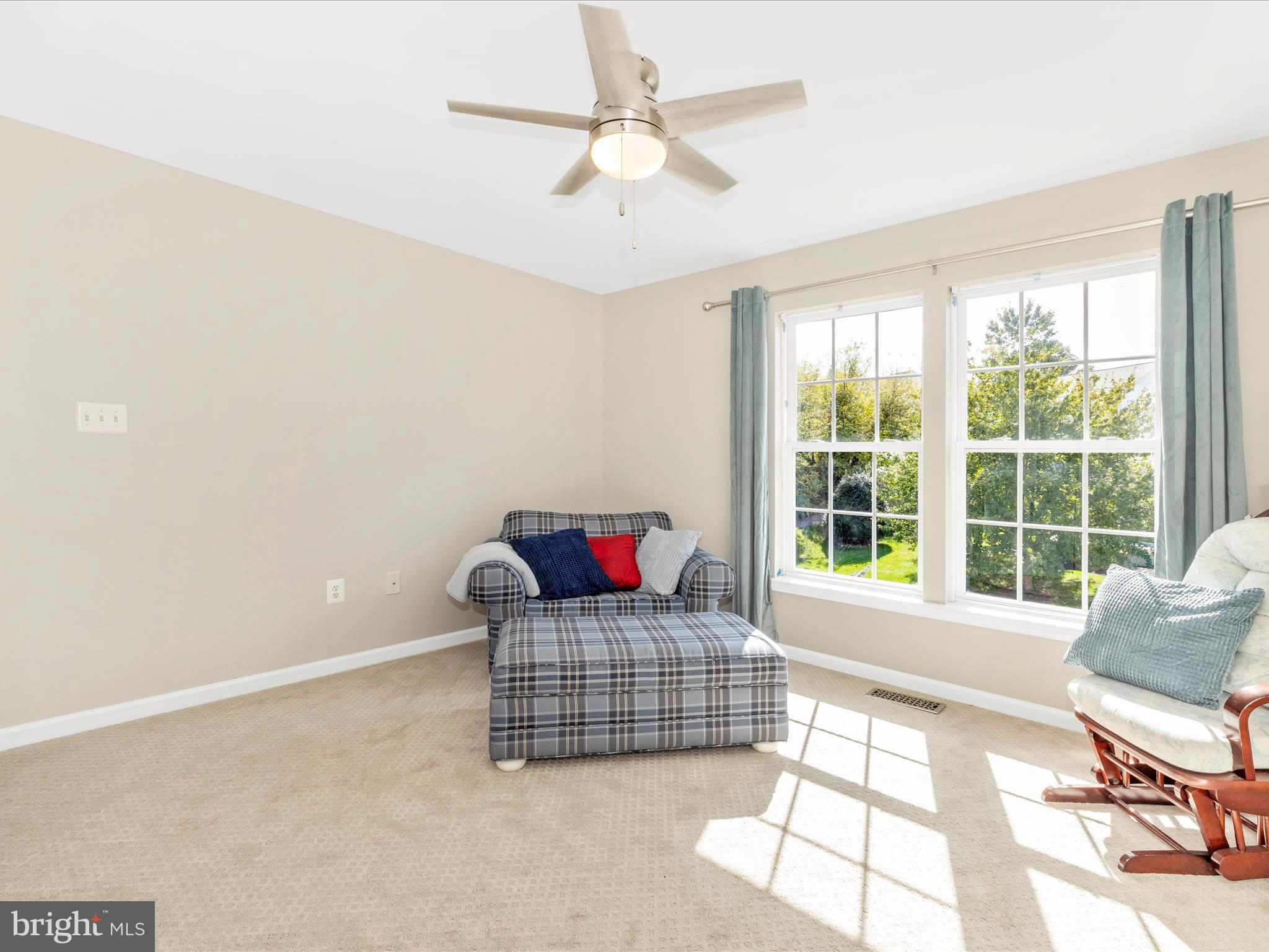 11046 Country Club Road New Market, MD 21774 - Photo 40 of 105 a living room with furniture and a window