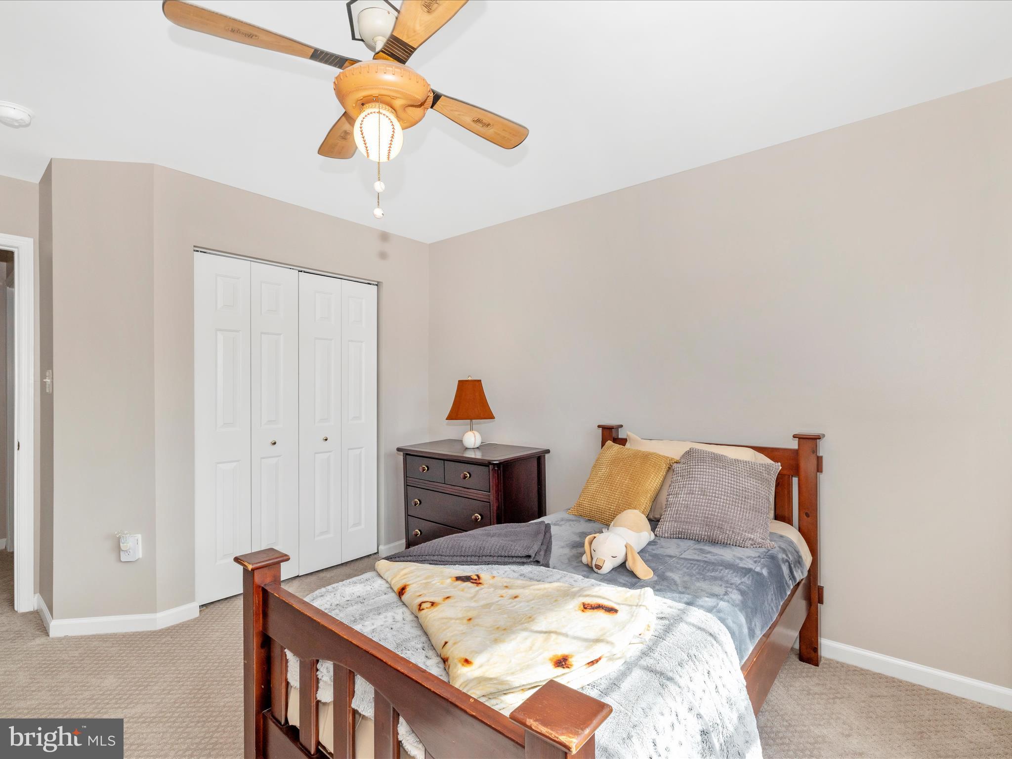11046 Country Club Road New Market, MD 21774 - Photo 42 of 105 a bed sitting in a bedroom and table
