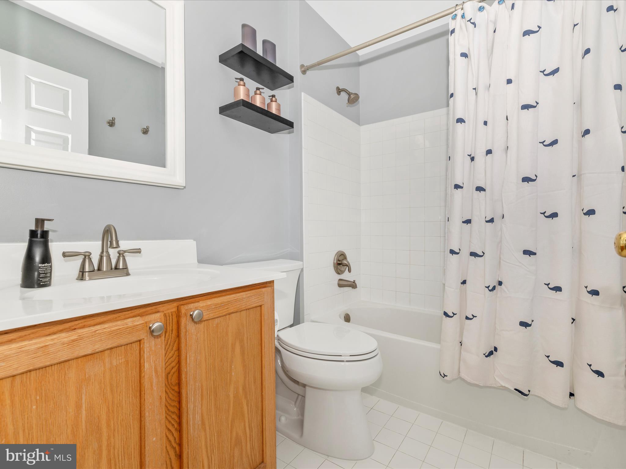 11046 Country Club Road New Market, MD 21774 - Photo 43 of 105 a bathroom with a sink toilet and shower