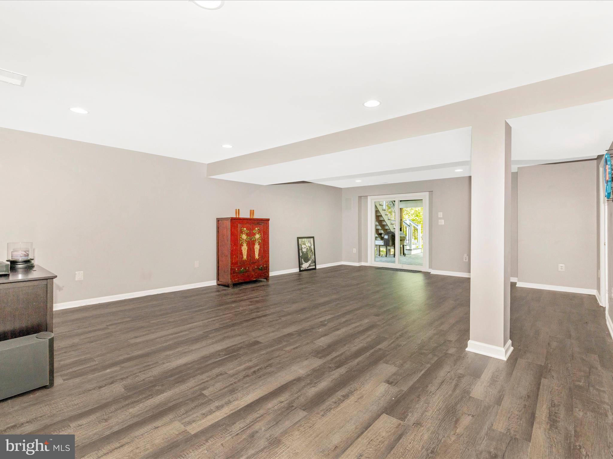11046 Country Club Road New Market, MD 21774 - Photo 44 of 105 a view of empty room with wooden floor and window