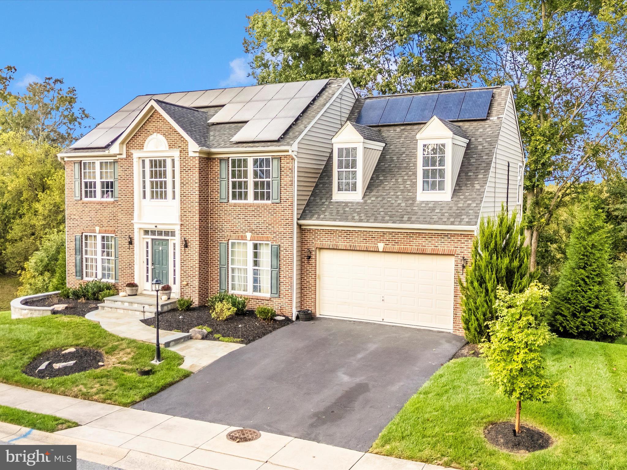 11046 Country Club Road New Market, MD 21774 - Photo 48 of 105 a front view of a house with garden