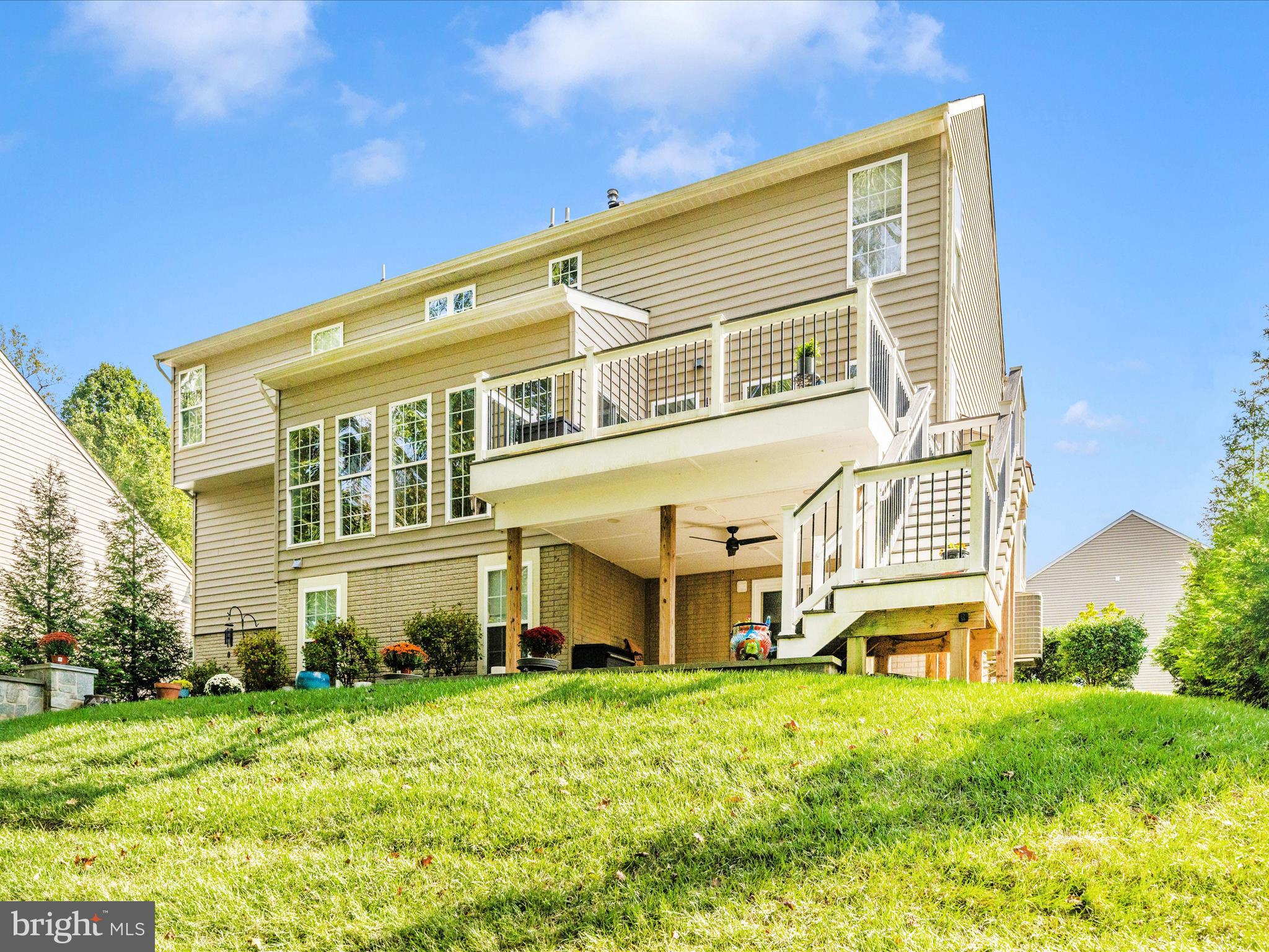 11046 Country Club Road New Market, MD 21774 - Photo 75 of 105 a large building with a big yard and more windows
