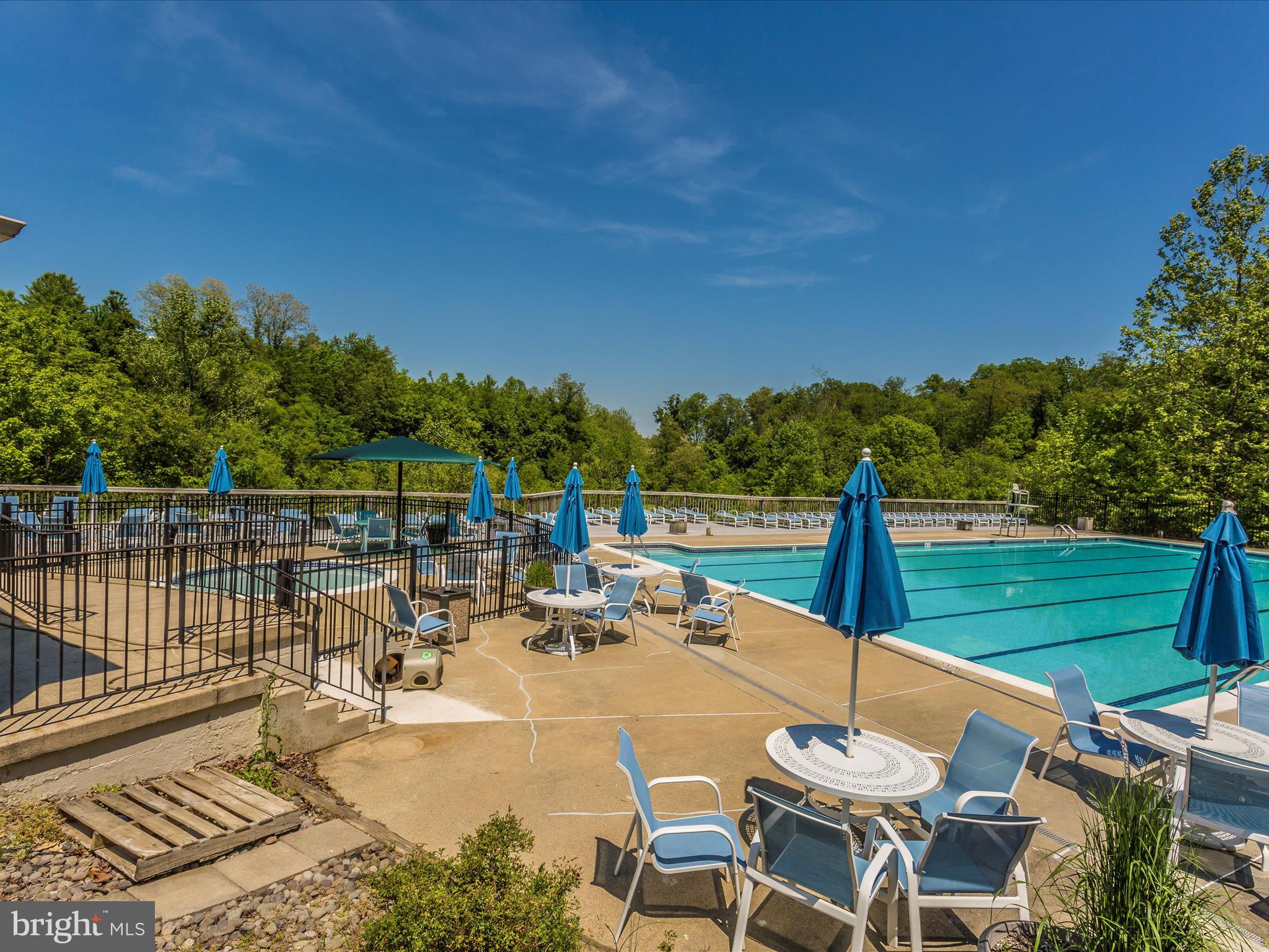 11046 Country Club Road New Market, MD 21774 - Photo 80 of 105 a view of a patio with a table chairs and a table