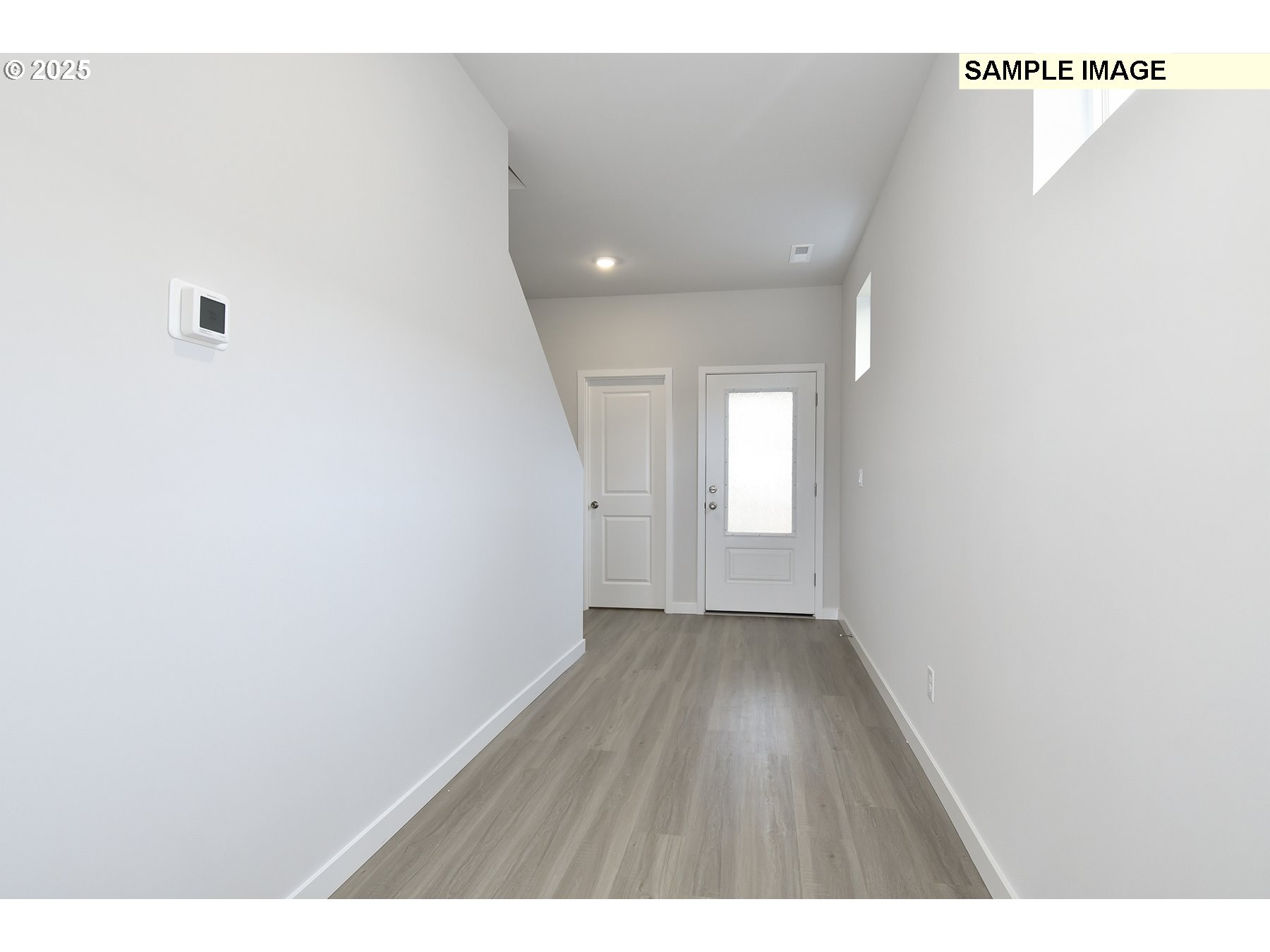 1122 Parkside Avenue Woodburn, OR 97071 - Photo 2 of 22 a view of an empty room and window
