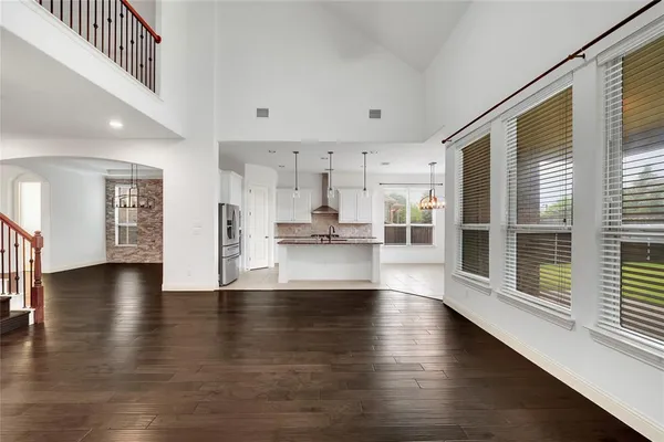 a view of an entryway with wooden floor