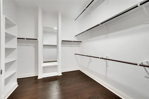 a view of an empty walk in closet