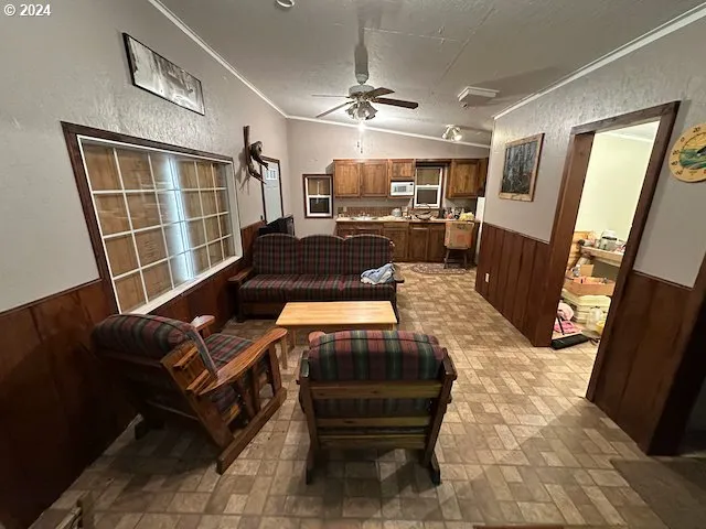 a living room with a rug and a table