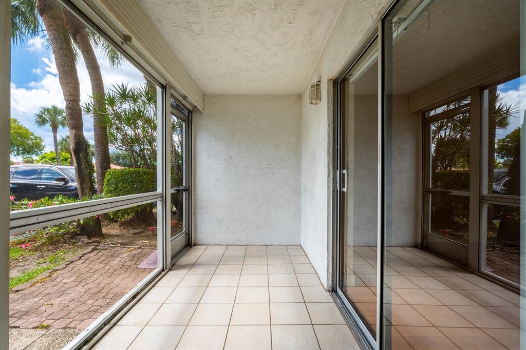 22605 Southwest 66th Avenue, Unit 102 Boca Raton, FL 33428 - Photo 13 of 27 a view of balcony