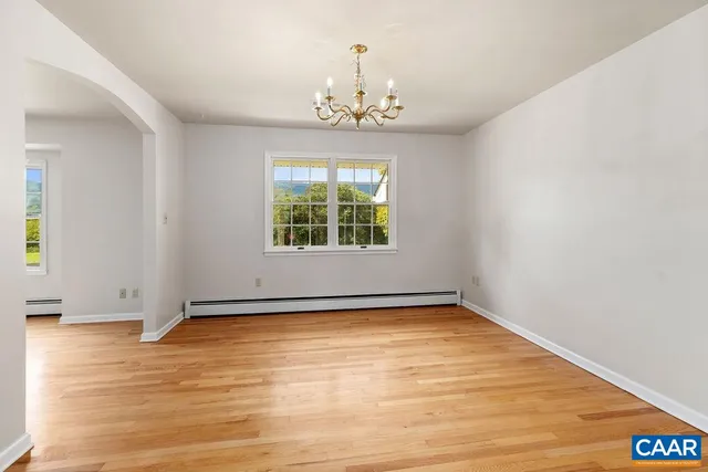 a kitchen with a sink stove top oven and cabinets