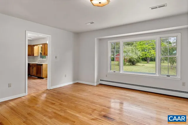 an empty room with windows