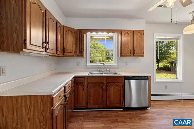 a bathroom with a sink vanity and a mirror