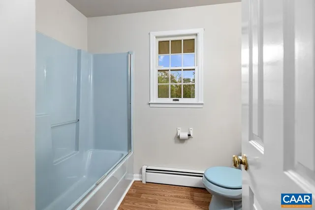 a view of a house with a yard and mountain