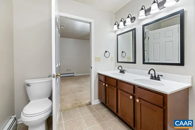 a view of a city with mountains in the background