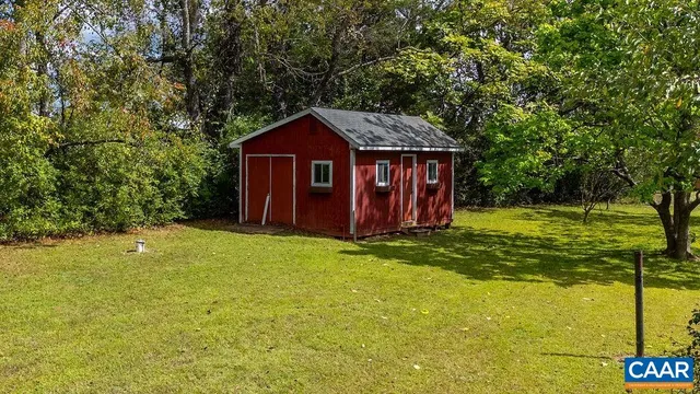 a view of a big yard with green space