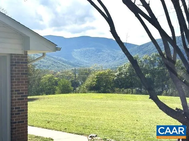 a view of swimming pool and mountain
