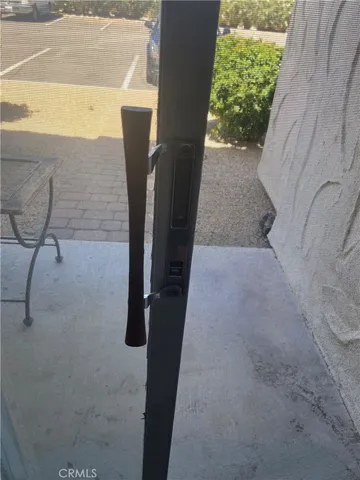 a view of a swimming pool with outdoor seating