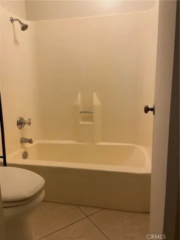 a view of a table and chairs in the patio