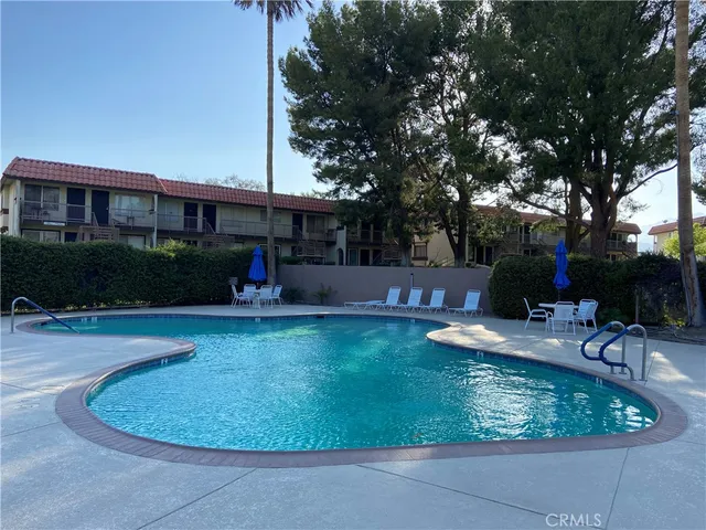 a view of a street with cars
