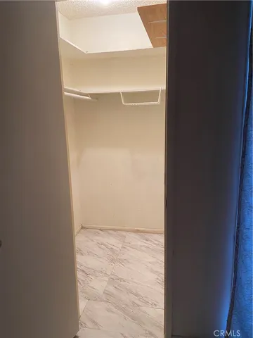 a bathroom with a bathtub and a toilet