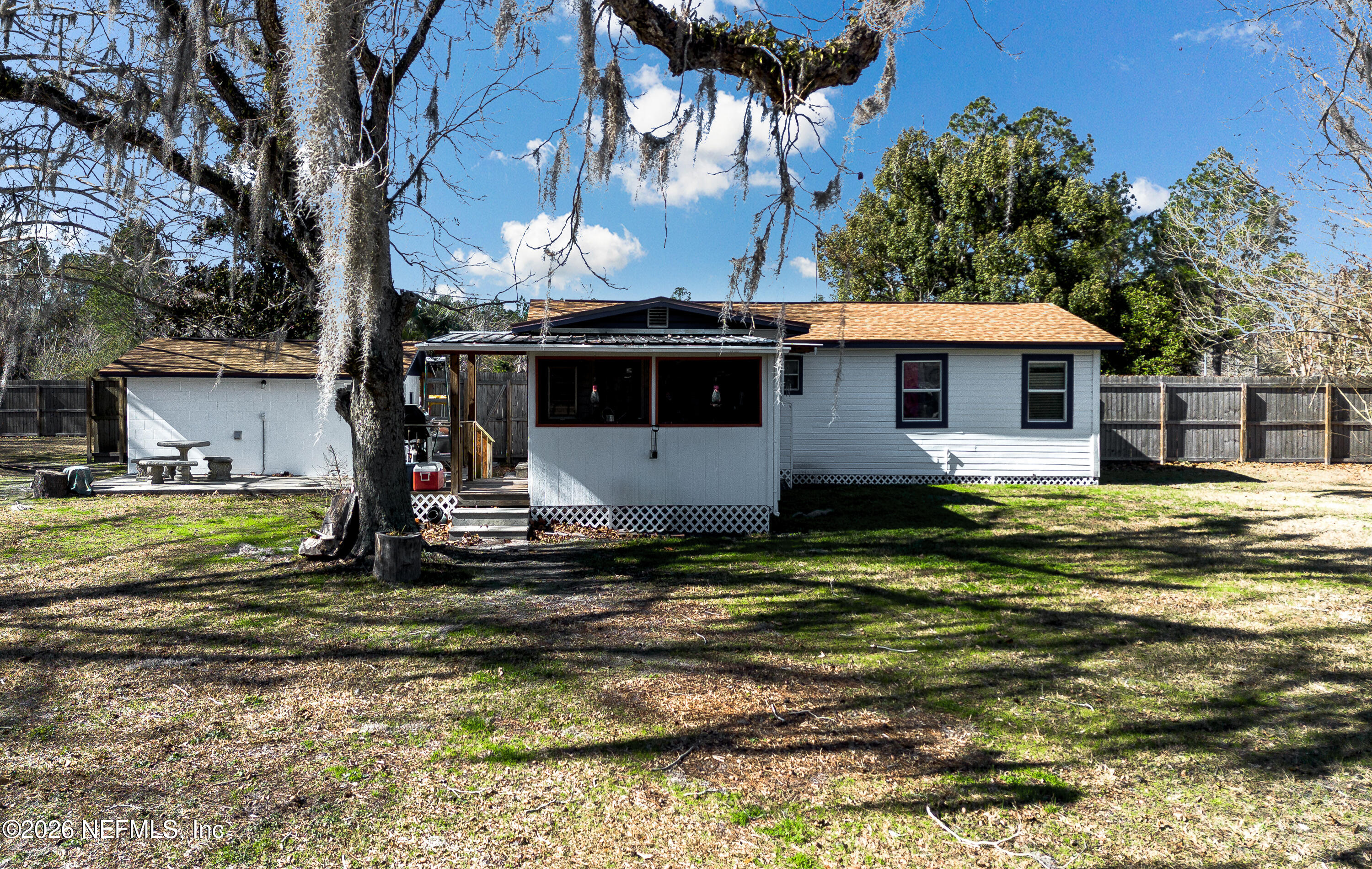 18273 Highway 16 Starke, FL 32091 - Photo 26 of 42 a view of a house with a swimming pool