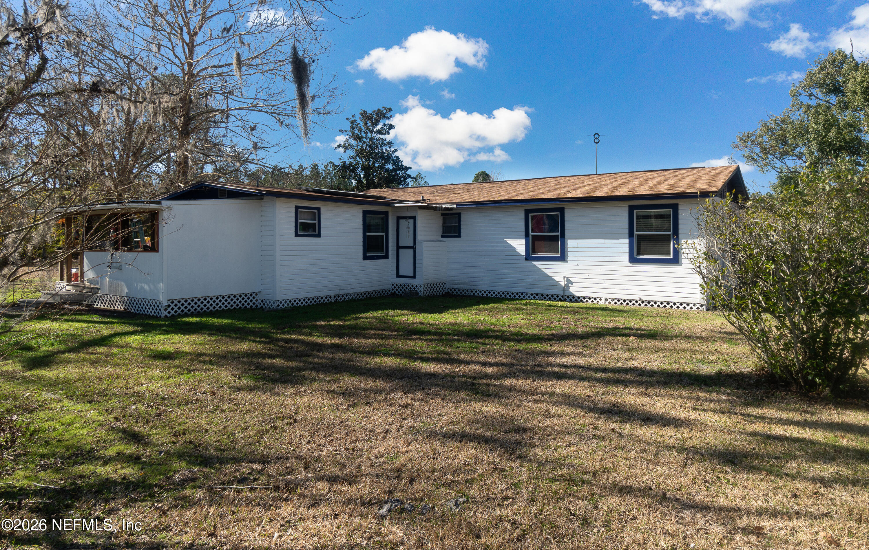 18273 Highway 16 Starke, FL 32091 - Photo 27 of 42 a view of a house with a backyard