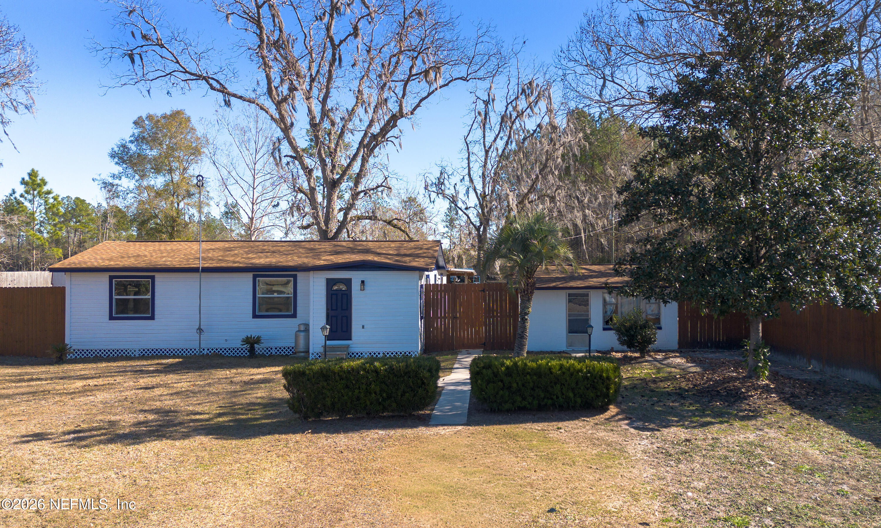 18273 Highway 16 Starke, FL 32091 - Photo 3 of 42 front view of a house with a yard