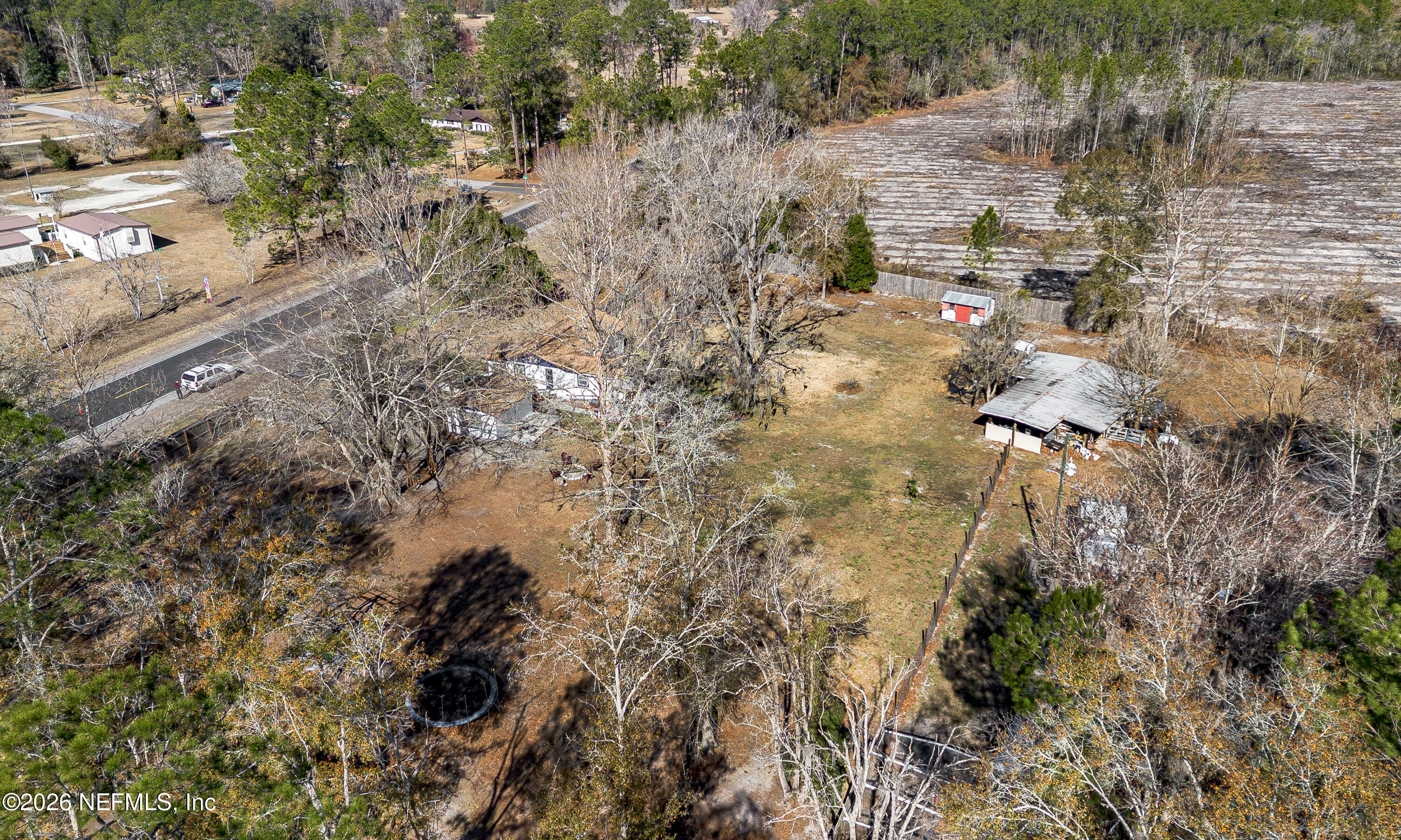 18273 Highway 16 Starke, FL 32091 - Photo 37 of 42 a aerial view of a house with a yard