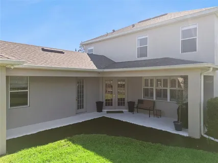 an aerial view of a house with a garden