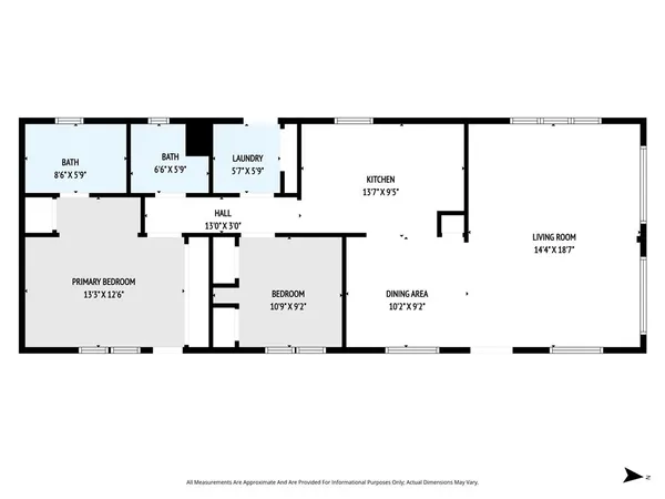 an aerial view of a house with a swimming pool