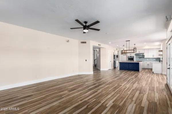 a view of a bathroom with wooden floor