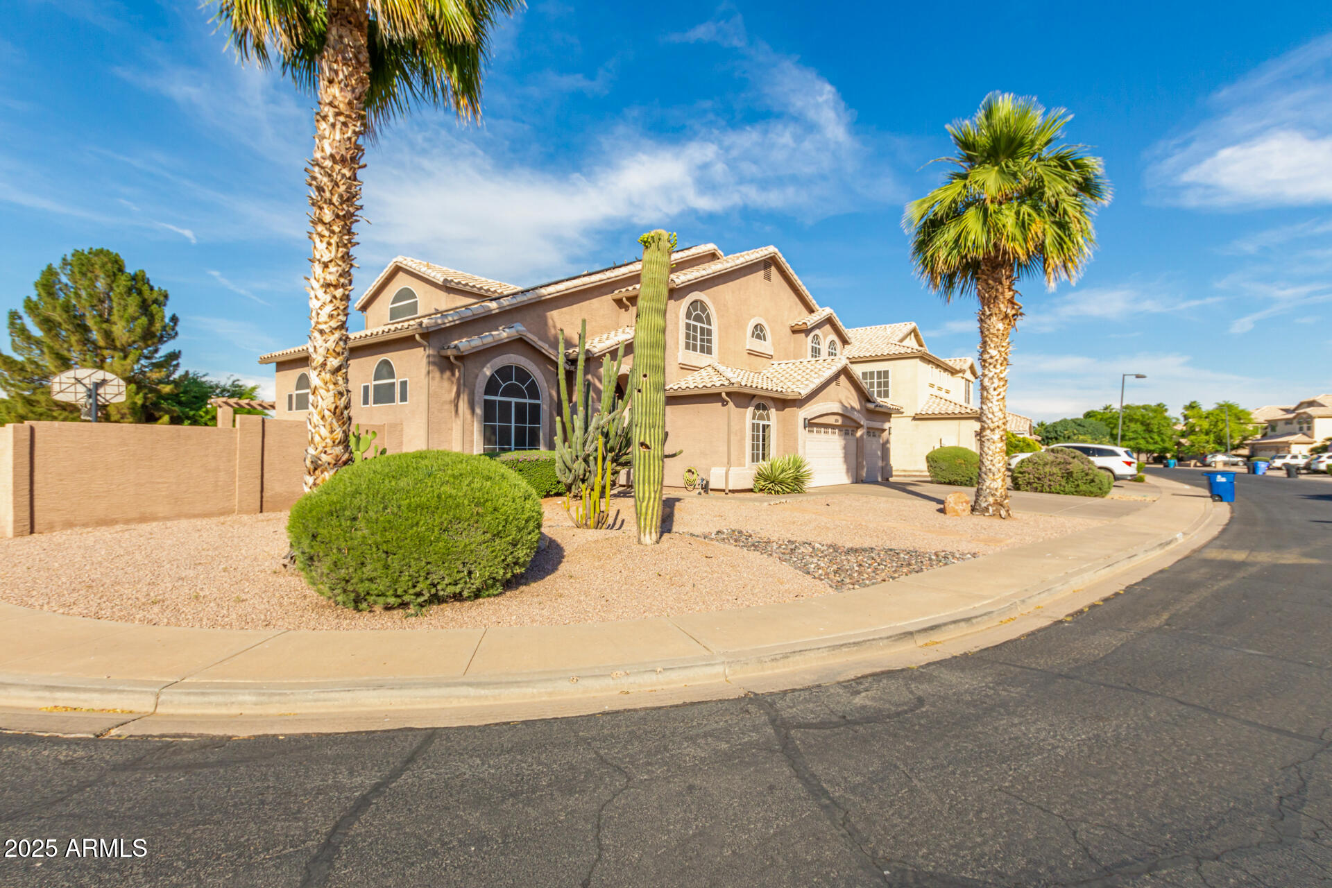 1874 West San Angelo Street Gilbert, AZ 85233 - Photo 2 of 55 a front view of a house with garden