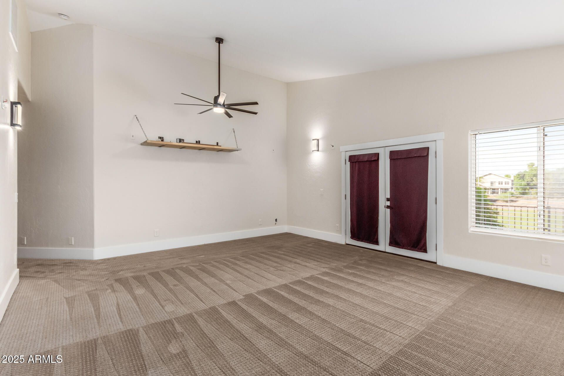 1874 West San Angelo Street Gilbert, AZ 85233 - Photo 28 of 55 a view of an empty room with a window